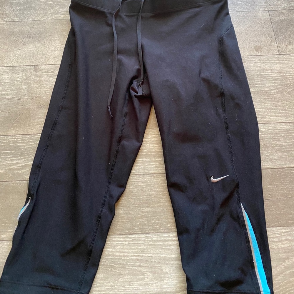 Nike Dri-fit leggings.  Knee length.